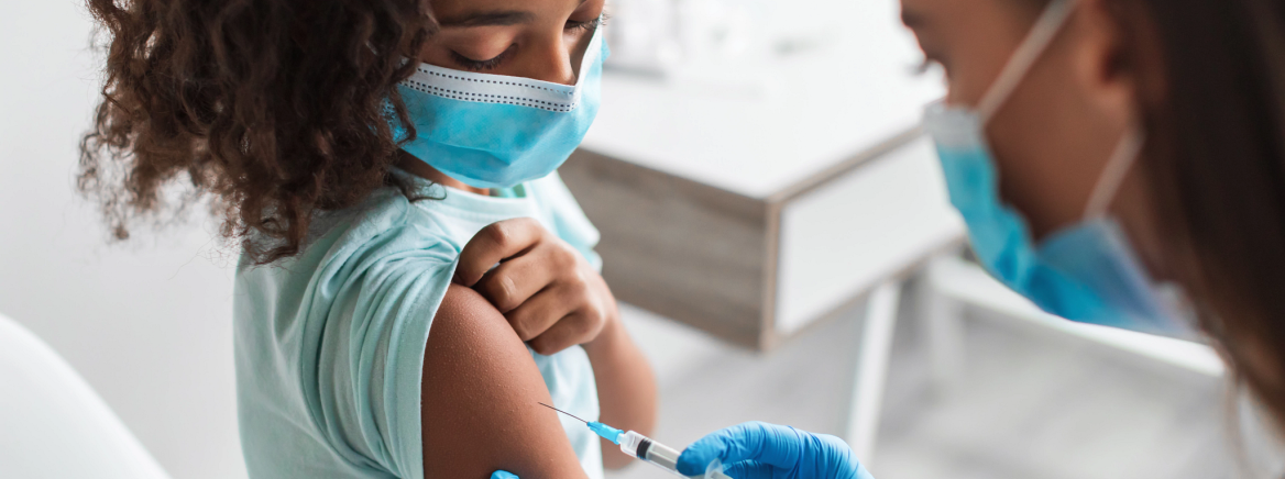Black Girl Getting Vaccinated For Covid-19 Prevention Sitting In Clinic Children Vaccination. Preteen Black Girl Getting Vaccinated For Covid-19 Prevention Sitting In Clinic. Medical Worker Wearing Face Mask Injecting Kid Patient. Antiviral Immunization. Cropped
