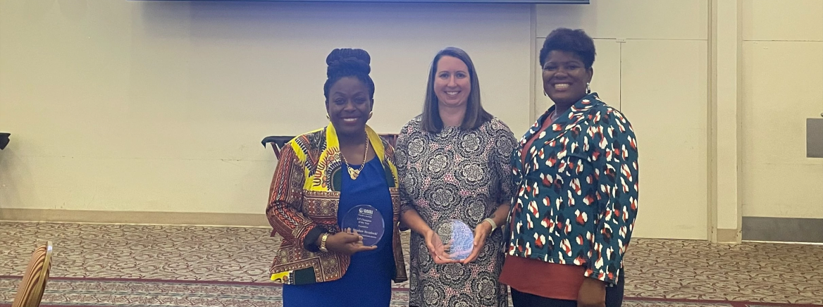 NAMI State Award Winners Three NAMI (National Alliance on Mental Illness) State Award Winners holding their award plaques.