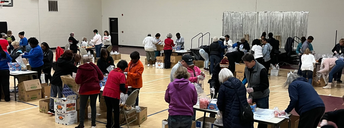 Senior Nutrition Holiday Gift Bag Packing Senior Nutrition volunteers packing holiday gift bags for homebound seniors in December 2024.