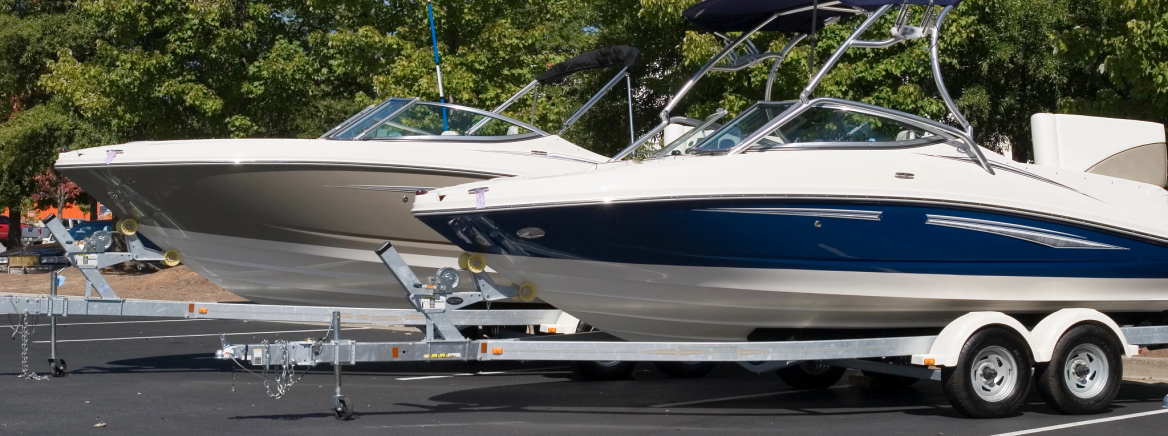 Header - IPP Photo of a ski boat on a trailer.