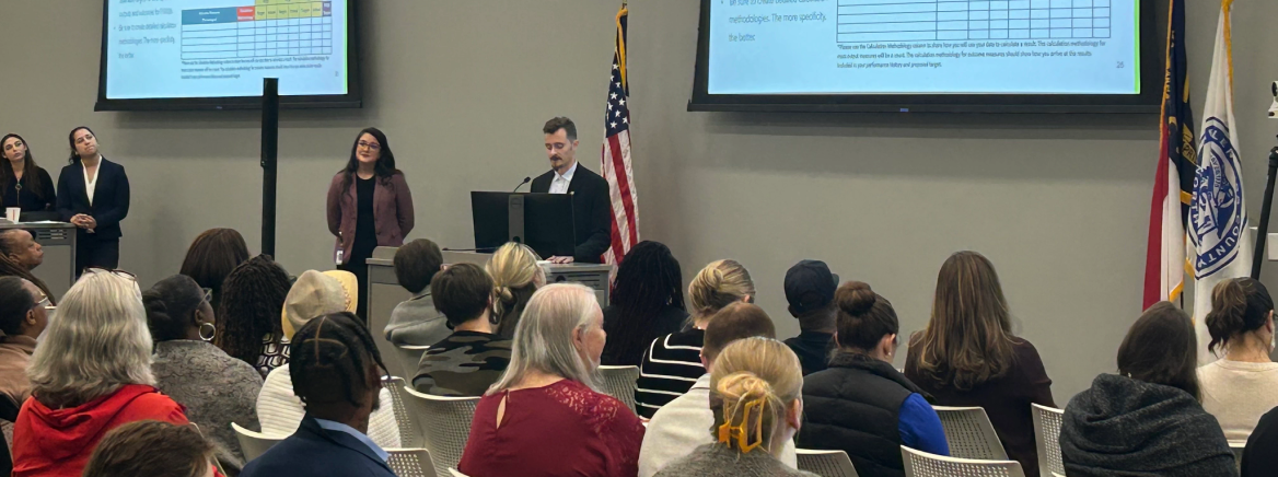 Community Service Grants Lauren Tayara and Gauge Tillman present at a CSG information session in November 2024.