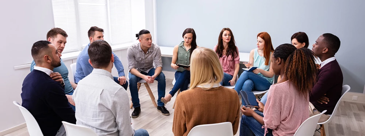 Health Young Adults Supportive Group Young Multiracial Millennial Friends Sitting In Circle Having Group Discussion