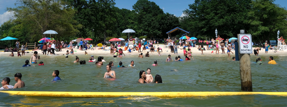 Ramsey Creek Beach Familes enjoying summer at Ramsey Creek Beach in Cornelius.