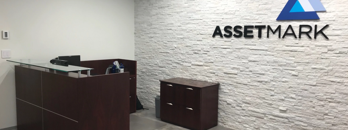 AssetMark Office An office with the AssetMark logo on the back wall