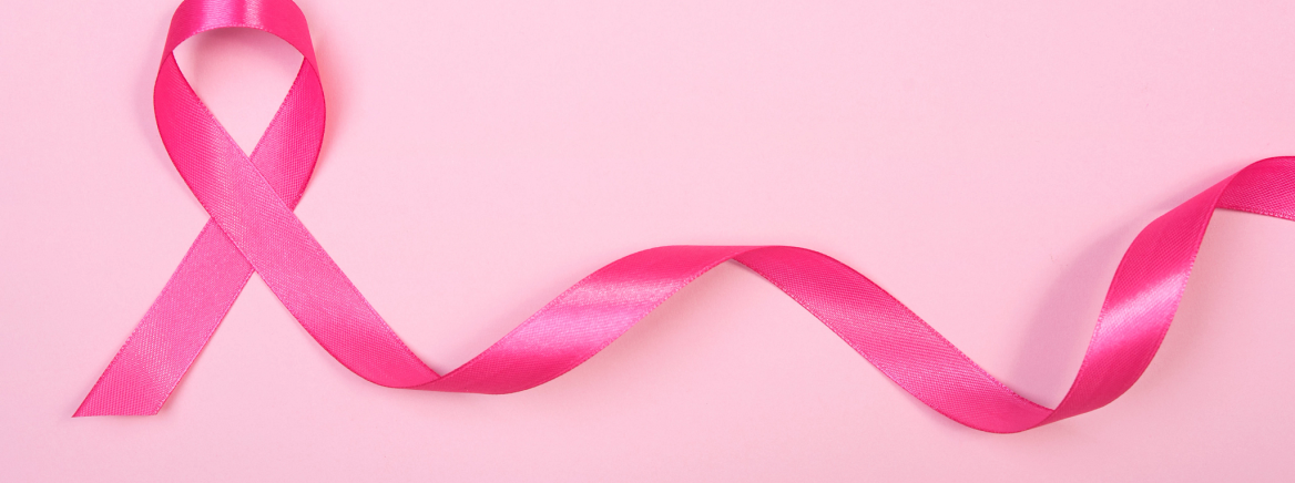 pink ribbon breast cancer on pink background. with copy space