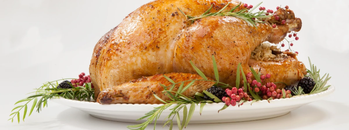 A turkey dinner on a plate.