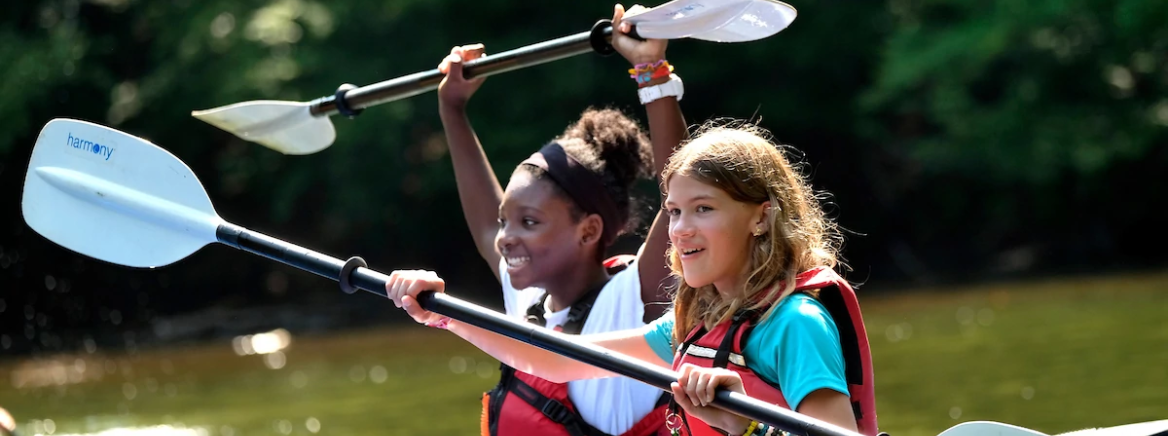 Two girls canoeing