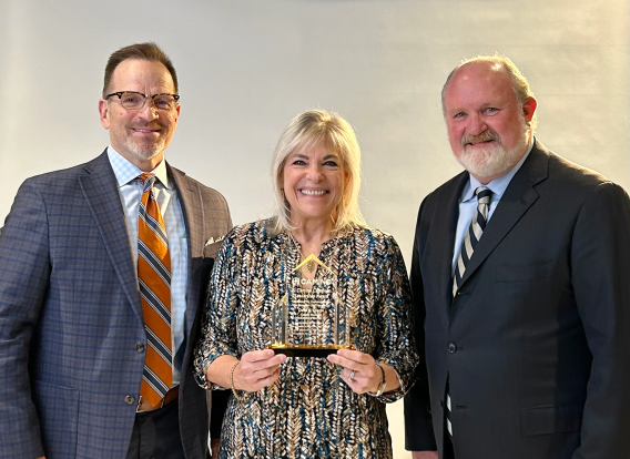 Dena with Camino leaders: Tim Hagler, Chief Public Affairs Officer on the left and Rusty Price, Founder on the right.