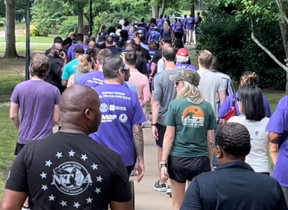 Several residents participate in the World Elders Abuse Awareness Walk at Freedom Park in June 2024.