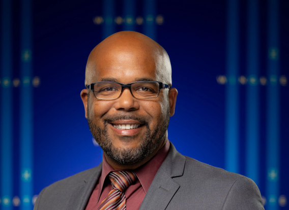 Headshot of Chris Rivera, director of economic mobility