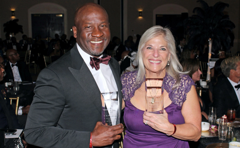 Dena R. Diorio and Bank of America chief administrative officer D. Steve Boland received the prestigious Whitney M. Young Award from the Urban League of the Central Carolinas in August 2023.